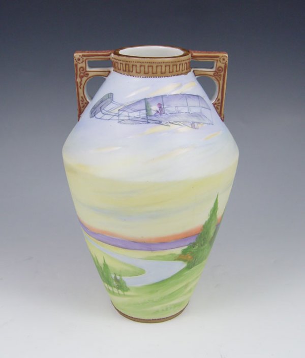 NIPPON HAND PAINTED VASE with BIPLANE: NIPPON HAND PAINTED VASE: Depicting aircraft over scenic landscape. Morimura Bros. mark. 8" tall.