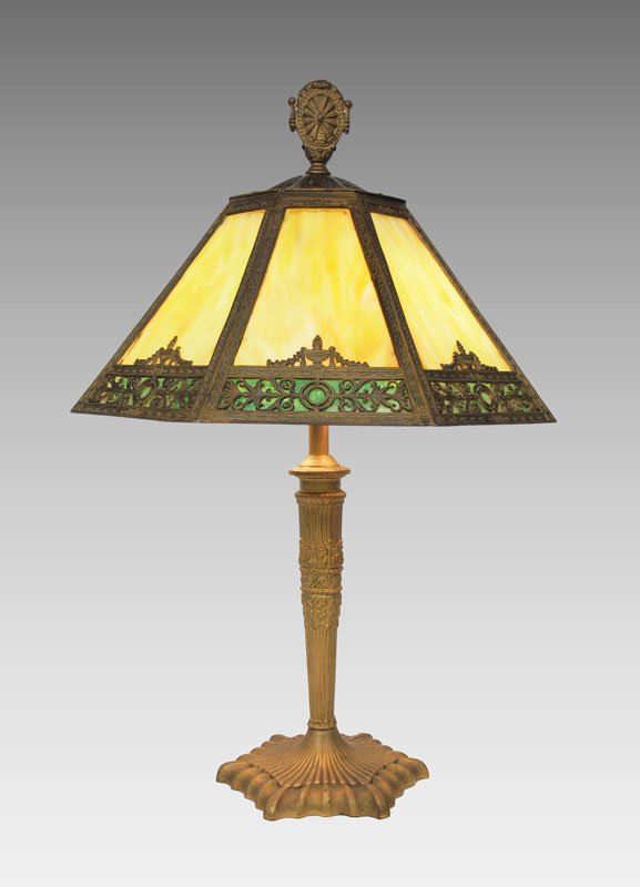 VINTAGE 8 PANEL SLAG GLASS BRONZE TABLE LAMP: VINTAGE 8 PANEL SLAG GLASS TABLE LAMP: Heavy bronze base with reed and acanthus leaf design, stylized bell flower motif to shade, two pull chain sockets, overall approx. 26 1/2"h., six sided base appr