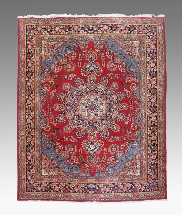 ESTATE HAND TIED IRANIAN CARPET 9 X 12: ESTATE HAND TIED IRANIAN CARPET: Approx. 12'9" x 9'10", center medallion, three border. red ground with blues.