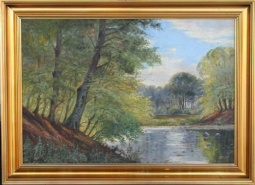 PETER BUSCH RIVERSIDE PAINTING: BUSCH, Peter, (American, 1861-1942): Forest stream, O/C, 22 1/2'' x 33'', signed lower left, original gilded frame with minor wear, 28'' x 38 1/2''. Condition - Minor craquelure, needs cleaning.
