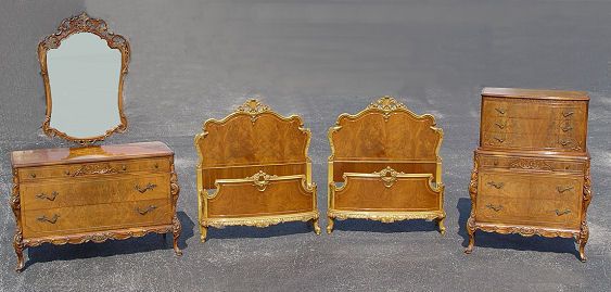 FRENCH BEDROOM by HOMER FURNITURE OF CHICAGO: FRENCH STYLE BEDROOM SUITE BY HOMER FURNITURE OF CHICAGO: Richly grained veneers with original and gilt adornment. Pair of TWIN BEDS, the headboard is 4'h. TALL CHEST (53 3/4" x 37 1/2" x 20"). DRESSE