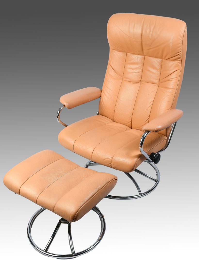 LEATHER CHAIR AND OTTOMAN: LEATHER CHAIR AND OTTOMAN: Stressless style leather reclining chair & ottoman with chromed rotating bases. Chair Approx. 41" h x 29" w x 25.75" d. Ottoman Approx. 16" h x 16" l x 17.25" w.