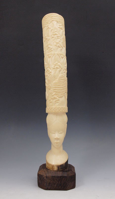 AFRICAN CARVED IVORY TUSK: AFRICAN CARVED IVORY TUSK: Ivory measures 14 1/2'' h.