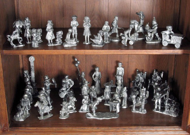 MICHAEL RICKER PEWTER CHILDREN FIGURINES: MICHAEL RICKER PEWTER CHILDREN FIGURINES: Approx. 42 piece to include "Peggy" 2230 COA, 7 1/2" h. x 3 1/2" x 2"; 3 "Justin" 678,860, 861 COA's; 2 "Ray" 1128, 1129 COA; ; 3 "Jon" 1101, 1102, 1103 COA's