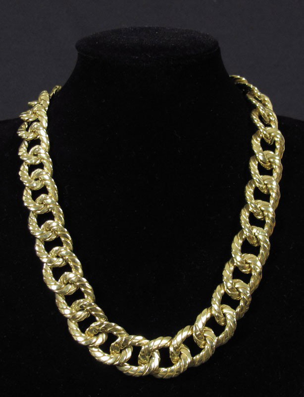 18K GOLD FANCY LINK NECKLACE 61.2 gms: 18K GOLD FANCY LINK NECKLACE: 18K yellow gold fancy spiral Cuban links. Locking closure with figure eight safety clasp. Length: 16" Weight: 61.2 grams.