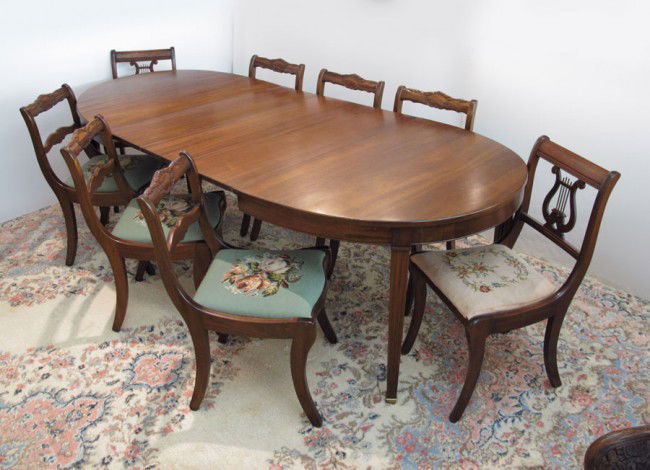 MAHOGANY OVAL DINING TABLE W/6 CHAIRS + 2 lyreback: MAHOGANY OVAL DINING TABLE WITH 6 CHAIRS: Splay leg dining table with 3 leaves. Set of 6 chairs, plus 2 lyre back chairs (8 total), all with needlepoint seats. Table 30" h. x 59" x 43", Chairs 33" h.