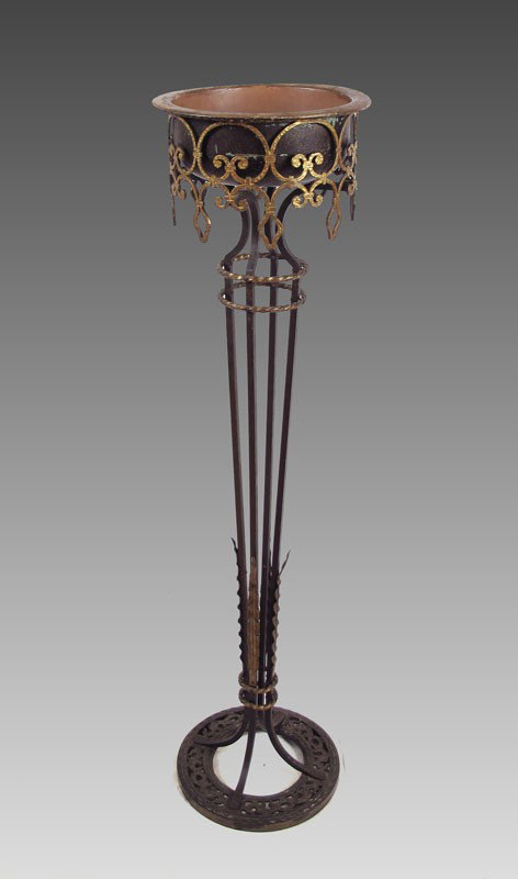 OSCAR BACH ERA IRON FERN STAND: OSCAR BACH ERA IRON FERN STAND: Scrolled and gilt iron stand, copper insert, 43" tall, 11" dia.