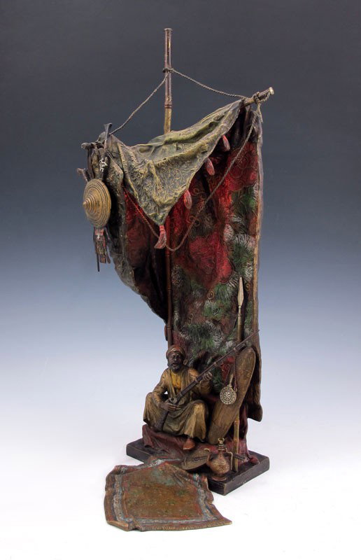 FRANZ BERGMAN AUSTRIAN ORIENTALIST LAMP 18.5'': BERGMAN AUSTRIAN BRONZE ORIENTALIST FIGURAL LAMP, ''A Seated Bedouin Guard'': Franz Xavier Bergman (1861-1936). Richly detailed in color and texture. Figural lamp depicting a man sitting with long rif