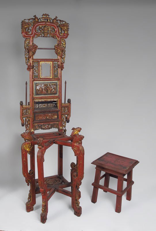 RED LACQUER AND GOLD CARVED CHINESE STAND: 19th c CHINESE CARVED STAND: Red lacquer finish with gold, double swing leg. Approx. 73'' tall x 23'' wide x 12'' deep. Sold with the stool.
