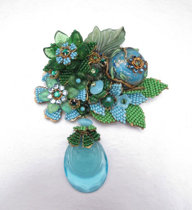 STANLEY HAGLER COSTUME JEWELRY BLUE BROOCH: STANLEY HAGLER COLORS OF THE SEA BROOCH: Signed Stanley Hagler NYC and Ian St. Gielar. 3 1/2''l.