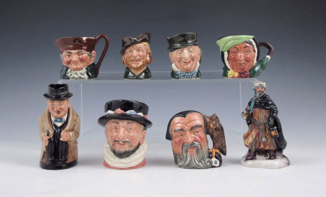 8 ROYAL DOULTON SMALL JUGS, TOBY MUG & FIGURINE: 8 ROYAL DOULTON - CHARACTER SMALL JUGS, TOBY MUG & FIGURINE: "Old Charles" RdNo 787515, 2 1/8", crazing; "Robin Hood", A mark, 2 3/8"; Mr. Micawber 1st Version; "Sairey Gamp" D 6045, rough rim; "Winst