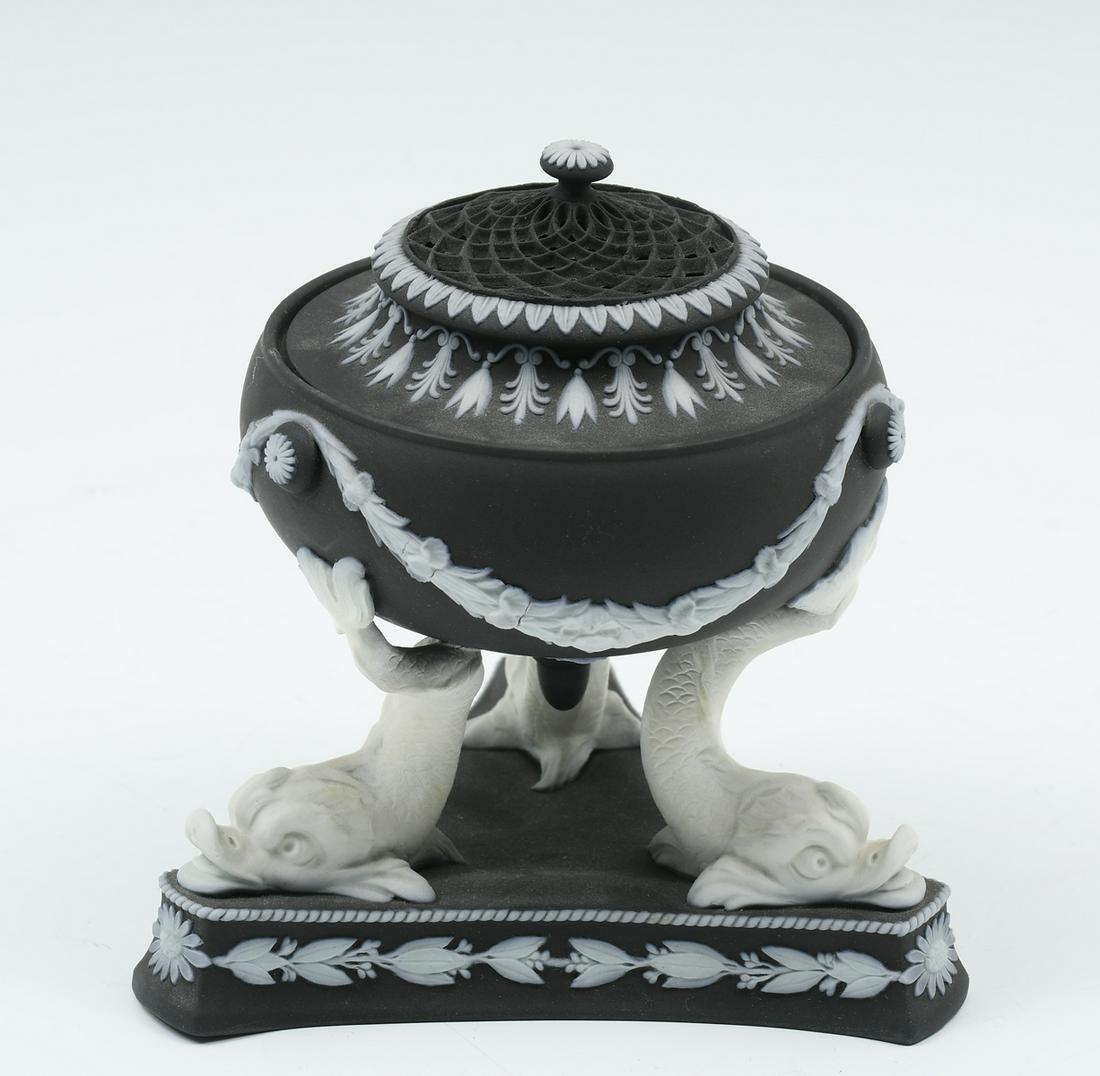 WEDGWOOD BLACK JASPER DIP PASTILLE BURNER & COVE: WEDGWOOD BLACK JASPER DIP PASTILLE BURNER & COVE: England, late 19th century, with pierced cover, the bowl mounted atop three dolphins set on a tricornered base, with pastille holder/insert disc, impr