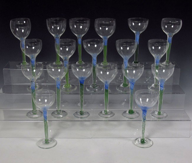 CHRIS BAKER-SALMON BLOWN GLASS STEMWARE: CHRIS BAKER-SALMON BLOWN GLASS STEMWARE: Contemporary studio art glass, 19 stems, approx. 8 1/2"h., goblet size varies.