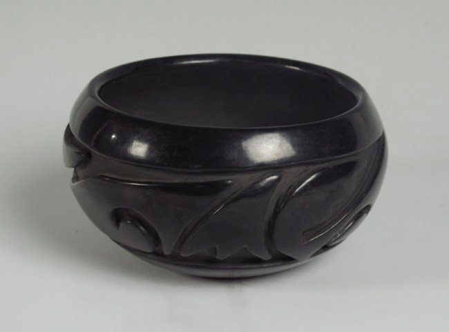 MARY CAIN SANTA CLARA PUEBLO POTTERY BOWL: MARY CAIN SANTA CLARA PUEBLO POTTERY BOWL: Carved figural serpent design, signed Mary Cain Santa Clara Pueblo. 4'' h. x 7 1/4''.