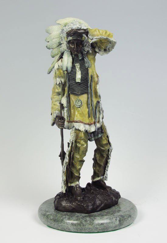 COLD PAINTED BRONZE AFTER CARL KAUBA: COLD PAINTED BRONZE AFTER CARL KAUBA: Indian Warrior Chief with Rifle Looking into the Distance, Bronze, 18''h, polished marble plinth, 20 1/2''h overall, incised signature.