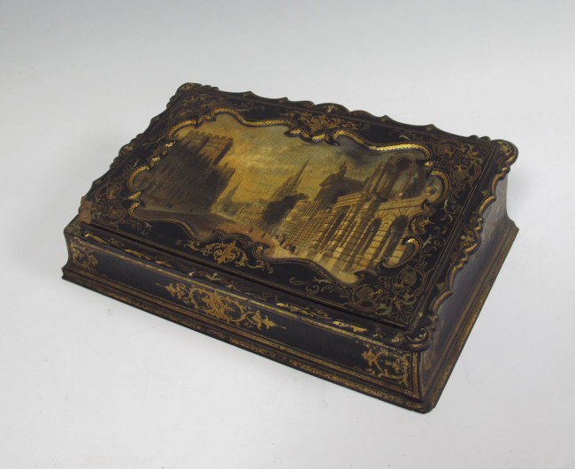 SIGNED SPIERS & SON PAPER MACHE DESK BOX OXFORD : SIGNED SPIERS & SON PAPER MACHE DESK BOX: The central cartouch with painting depicting High Street, Oxford. Ornate gilt scroll work and edging. Velvet interior, pen well and ink bottles. Approx. 5"h. 