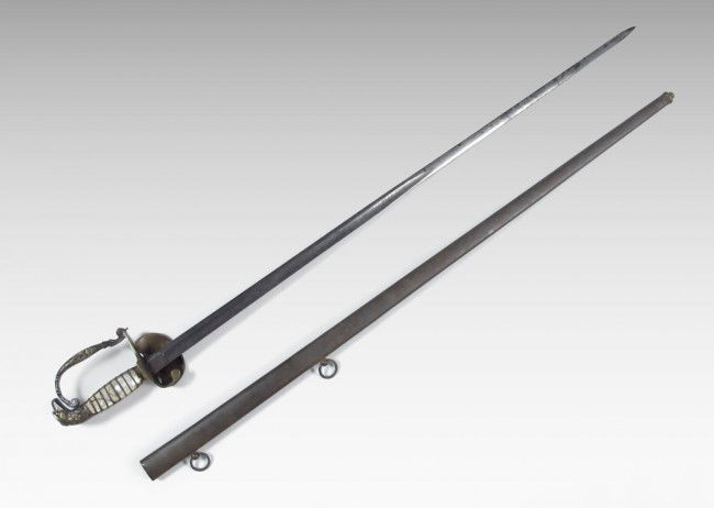 1830S EAGLEHEAD INFANTRY OFFICERS SWORD & SCABBARD: 1830'S EAGLEHEAD INFANTRY OFFICERS SWORD & SCABBARD: Eaglehead pommel with original mother of pearl grip and full eagle langet. Etched 31'' blade with eagle and motto, stand of arms and other military