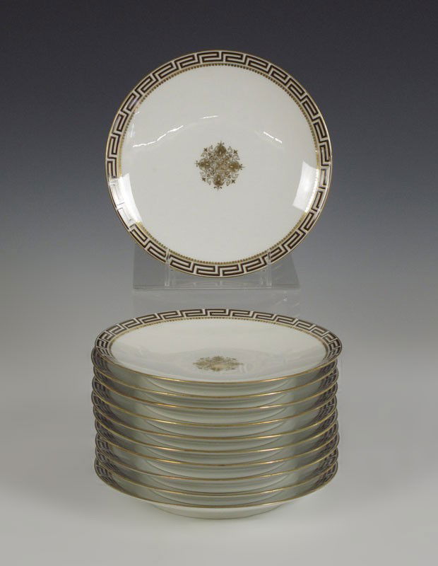 REDON FRENCH LIMOGES PLATES: SET OF 11 FRENCH LIMOGES PLATES: M. Redon, Ca. 1882-1890. Greek Key design with central medallion. 8 1/4'' dia.