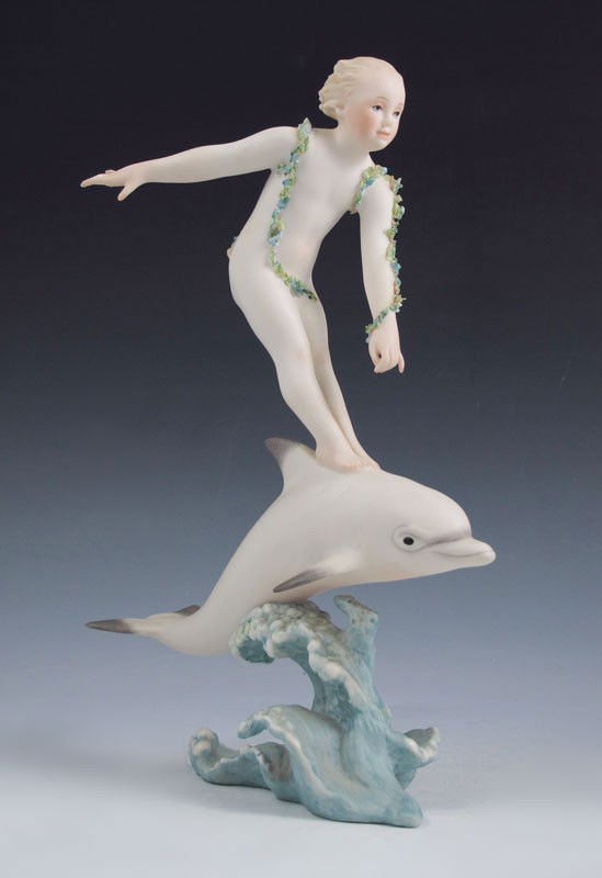 CYBIS ARION THE DOLPHIN RIDER: CYBIS PORCELAIN "ARION THE DOLPHIN RIDER": Signed by Jean Cousteau, #463, 10" tall.