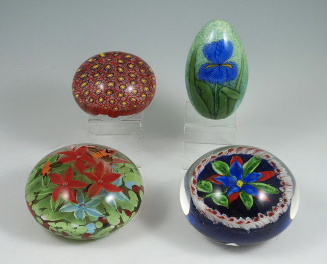 4 ART GLASS PAPERWEIGHTS ORIENT & FLUME & MURANO : 4 ART GLASS PAPERWEIGHTS: To include Orient & Flume egg shaped paperweight with an Iris design, with the box, 4" tall. Sold together with 3 Murano glass paperweights, 3" - 4" dia.