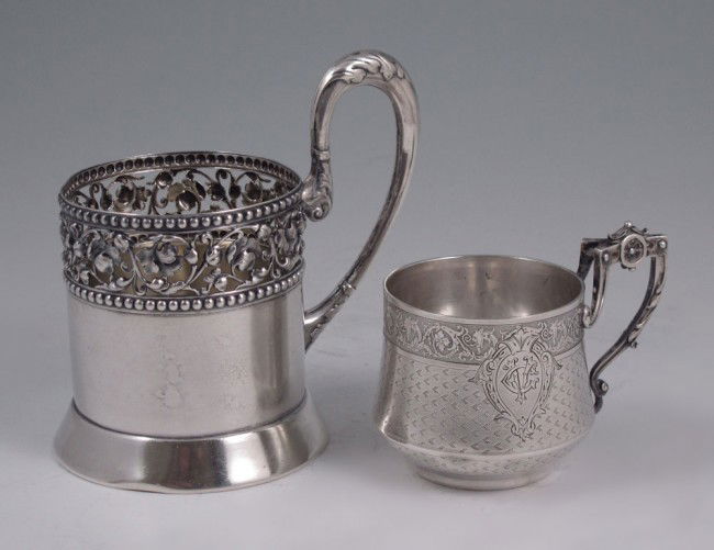 2 PIECE FRENCH SILVER CUPS: 2 PIECE FRENCH SILVER CUPS: 2 pieces to include 1) Unknown French maker with Paris guarantee coffee or chocolate cup, missing insert. Pierced foliate scroll rim. 4 1/2" h. x 4 3/4". 2) V. Boivin choco