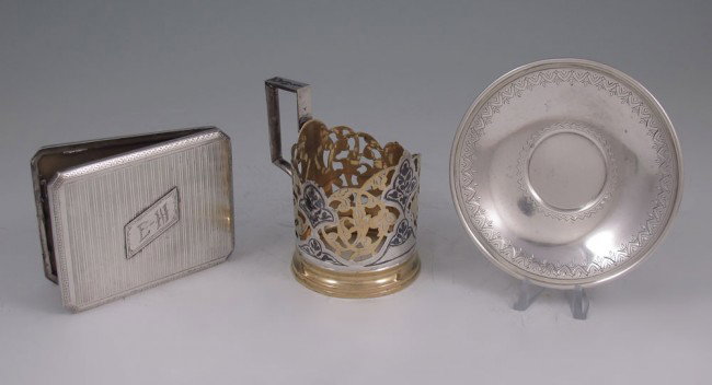 RUSSIAN SILVER CUP, SAUCER & CARD CASE: RUSSIAN SILVER CUP, SAUCER & CARD CASE: To include 1) 1891 Vasily Baladonov Moscow 84 zolotnik saucer with engraved decoration. 4 1/2 dia. 2) Unknown Russian maker with illegible hallmarks card case w