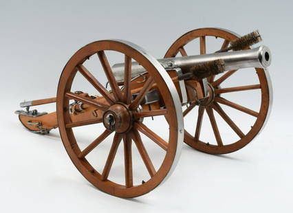 SPANISH BLACK POWDER MODEL CANNON: SPANISH BLACK POWDER MODEL CANNON: Barrell 15" marked Spain, Napoleon III model, resembling the cannons used by North and South during The Civil War, metal rimmed wheels 11.5" diameter, 28.5" overall.