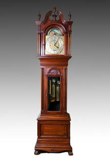 TIFFANY AND CO. FIVE TUBE GRANDFATHER CLOCK: TIFFANY AND CO. FIVE TUBE GRANDFATHER CLOCK: Surmounting turned finials on a scrolling broken pediment. Pierced gilt scrolling foliate motif face, below painted moon dial. Raised on carved claw on