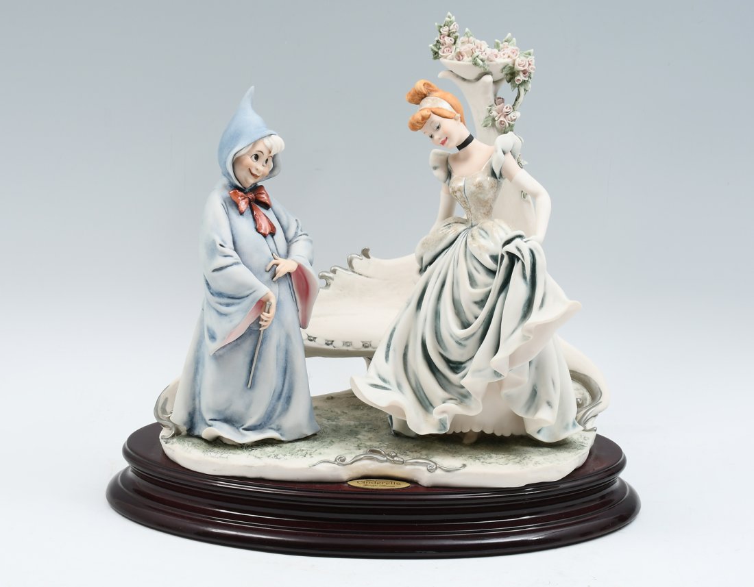 GIUSEPPE ARMANI CINDERELLA AND FAIRY GRANDMOTHER: GIUSEPPE ARMANI CINDERELLA AND FAIRY GODMOTHER GROUPING: For Disney, in celebration of Cinderella's 50th anniversary. Incised at the observe. #259/975. Signed in ink at the reverse. Approx. 13.25" h x