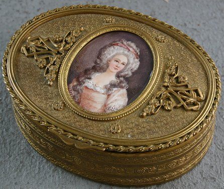 JEWELRY CASKET W/ SIGNED MINIATURE PAINTING IVORY: EMBOSSED BRONZE AND MIXED METAL JEWELRY CASKET WITH OVAL INSET MINIATURE WATERCOLOR PAINTING ON IVORY SIGNED OLIVIER: Interior of the box is adorned with floral tapestry design, 4 1/2" h x 4 1/2" w x