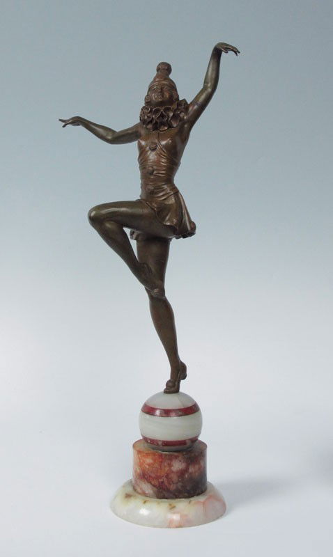 FEMALE HARLEQUIN NUDE DECO DANCER BRONZE: FEMALE HARLEQUIN NUDE DANCER BRONZE: 15''h, 19 1/2'' overall including onyx and marble shaped plinth, no visible signature circa 1930 in the style of Lorenzl.