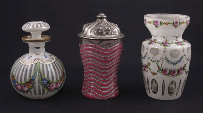3 PIECE EARLY BOHEMIAN GLASS: 3 PIECE EARLY BOHEMIAN GLASS: To include 1) Enameled floral design jar with stopper. 5 1/4" h. x 6" dia. 2) Enameled covered beaker with pink wavy lines, 1854 13 loth Austrian silver floral repousse c