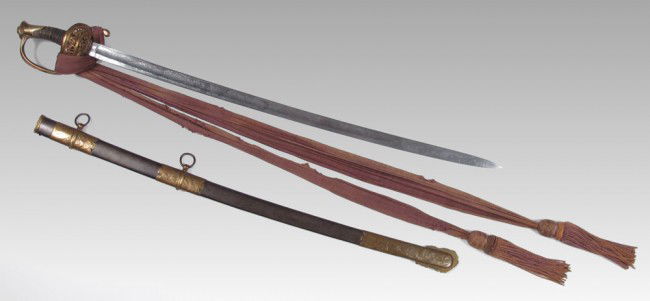 1850 FIELD & STAFF OFFICERS SWORD & SASH: MODEL 1850 STAFF AND FIELD OFFICERS SWORD, SCABBARD, AND SASH: Ornate grip with engraved pommel, US shield on cap and US in guard. Original shark / rayskin grip and wire. Import 32'' blade, most likel