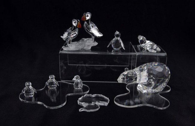 SWAROVSKI CRYSTAL ANIMALS OF THE ARTIC: SWAROVSKI CRYSTAL FIGURES ANIMALS OF THE ARTIC: 5 (10) piece to include, POLAR BEAR 7649, A. Stocker, issued 1986 retired 1997; Set of 3 BABY PENGUINS 7661, A. Stocker, issued 1997, with ''ice flow'' 