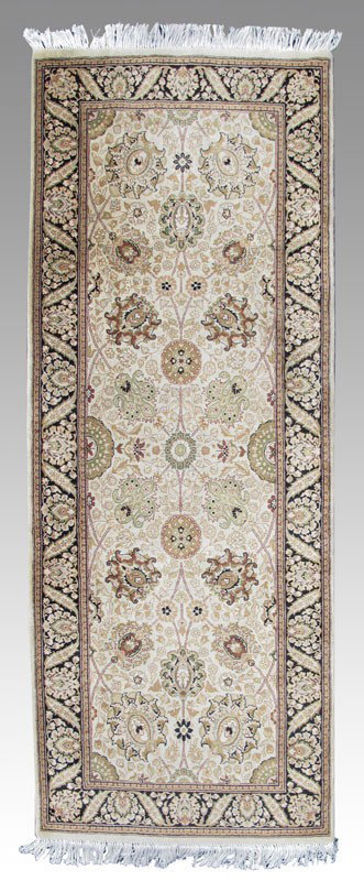 MODERN SINO(CHINESE) PERSIAN HAND KNOTTED WOOL RUG: MODERN SINO(CHINESE) PERSIAN HAND KNOTTED WOOL RUG, 2' 4" x 6' 4": This small runner has a mostly soft palette with an ivory field that is covered with a sinuous design of palmettes and flower heads i