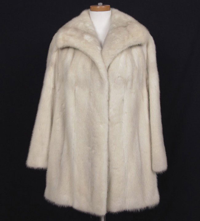 WHITE MINK FUR JACKET: WHITE MINK FUR JACKET: Wm. A. Lewis label. Car coat length, 33"l., slits for sash or belt.