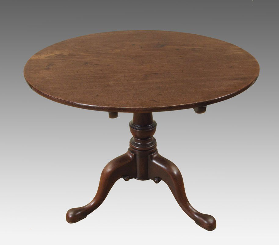 EARLY 19TH CENTURY GEORGIAN TILT TOP BREAKFAST TABLE: EARLY 19TH CENTURY GEORGIAN TILT TOP BREAKFAST TABLE: Round mahogany top over heavy turned base, three cabriole legs and snake foot. Original brass hardware. 28 1/2" h. x 37" dia.