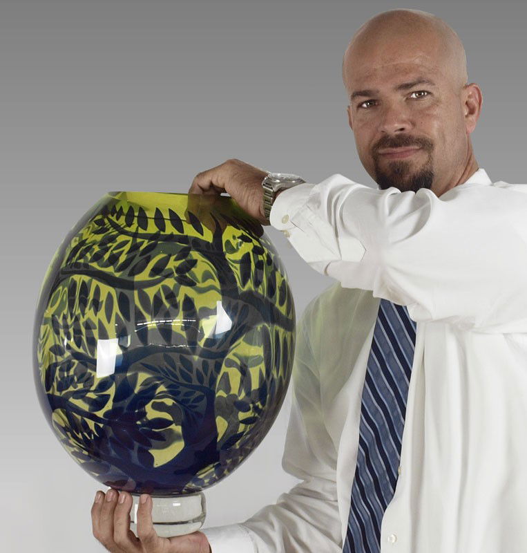 LARGE DUNCAN McCLELLAN ART GLASS VASE: McCLELLAN, Duncan, (American, 1955-): Heavy green / yellow glass with blue trees and leaves, signed on clear base. 17 1/4'' h. x 12 1/2'' dia.