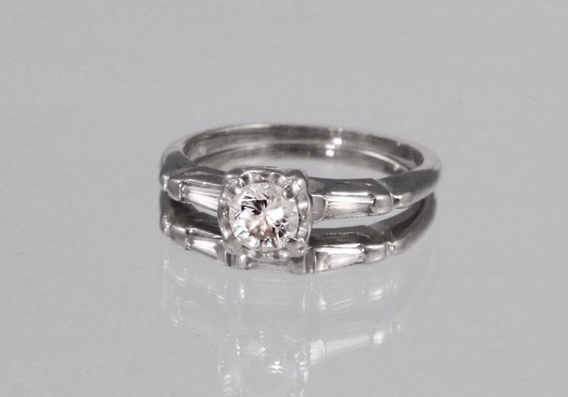 .50CTW DIAMOND ENGAGEMENT RING & BAND 14K SZ 5.25: 14K GOLD .50 CTW DIAMOND RING AND BAND BRIDAL SET: 14K white gold Bridal set contains one round brilliant cut diamond and three baguette cut diamonds. Weight: .50 Ct. Approx. The diamond average VS in