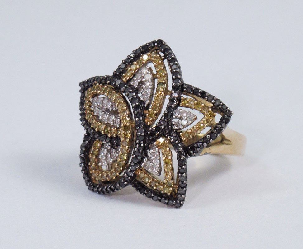 YELLOW BLACK AND WHITE DIAMOND 10K GOLD RING: YELLOW, BLACK AND WHITE DIAMOND STAR 10K GOLD RING: 10K yellow gold ring contains 200 round single cut diamonds. Weight: 1.00 Ct. Approx. The diamonds average I1 in clarity and black, yellow and white