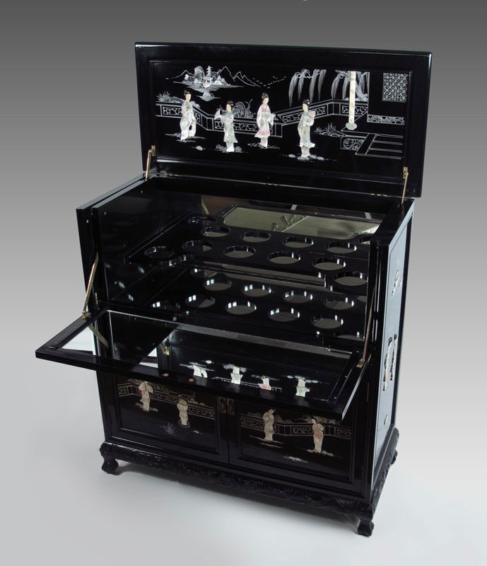 MOTHER OF PEARL LACQUER BAR MIRROR INTERIOR: CONTEMPORARY BLACK LACQUER BAR: Mechanical lift top with mirrored interior, lower section with doors and interior drawer. Hand painted and applied mother of pearl decoration. Approx. 42" h. x 40" x 18
