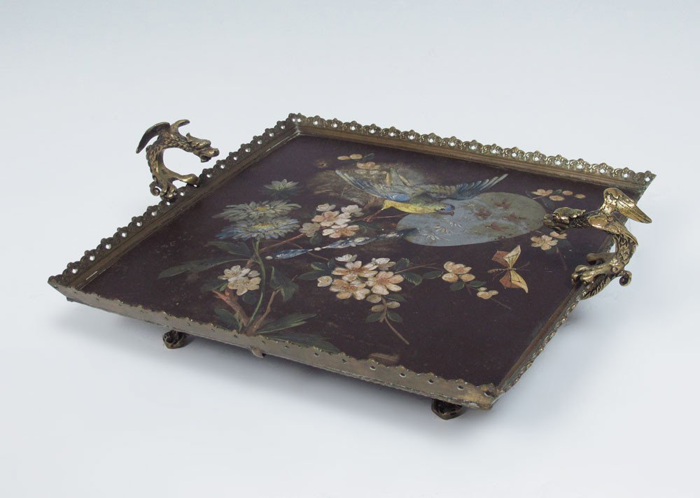 19TH C ENAMELED TRAY with DRAGON HANDLES : 19TH C ENAMELED TRAY: Reticulated brass frame with dragon handles and masqueron figural feet. Hand painted image of a bird among the blossoms and Japanese fan. 4 1/2" x 15" x 12" overall. Purchased in