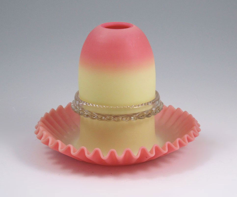 THOMAS WEBB & SON BURMESE GLASS FAIRY LAMP: SIGNED THOMAS WEBB & SON BURMESE GLASS FAIRY LAMP: Large size with reversible skirt base. Signed Clark candle insert. 5 1/2" tall 7" dia. overall.