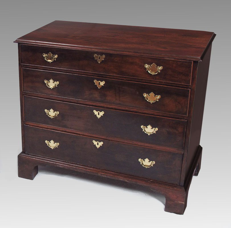 19th C GEORGIAN MAHOGANY CHEST: GEORGE III MAHOGANY CHEST CA. 1800: Four drawer chest on shaped bracket feet. Brass batwing pulls, later lining in the drawers. Approx. 34 1/4 x 39 3/4 x 22''.