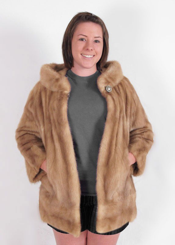 1960'S STYLE MINK CAR LENGTH COAT: LAZARUS OF COLUMBUS TAN MINK COAT: 60's style medium length coat that has a cream tan lining with scattered floral leaf pattern, monogramed S.L .D to the inner right side. Medium in size it has front