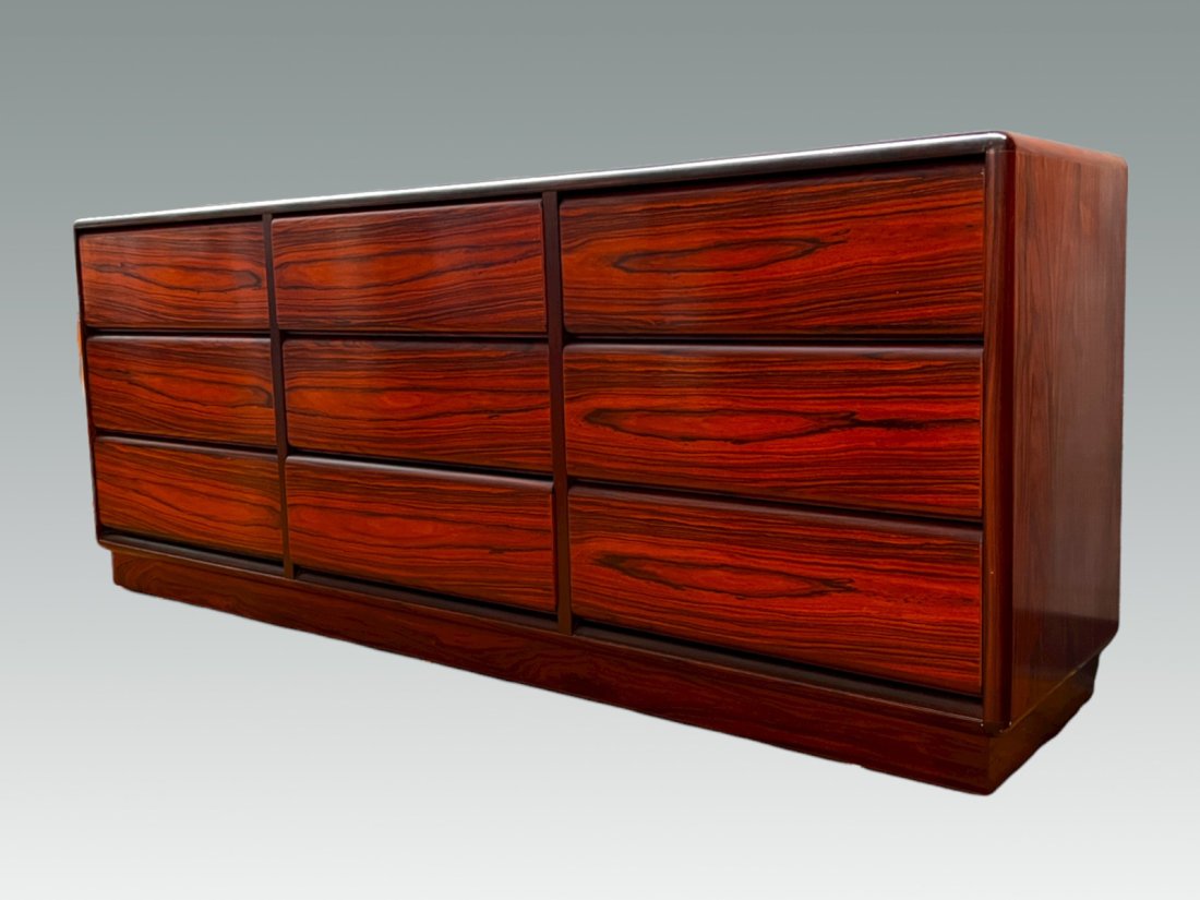 MID-CENTURY DANISH BROUER ROSEWOOD DRESSER: MID-CENTURY DANISH BROUER ROSEWOOD DRESSER: Mid-century modern Danish Brouer 9-drawer Rosewood chest with birch interior. Approx. 30" h x 75" w x 18" d.