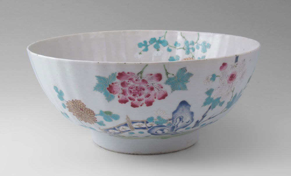 CHINESE EXPORT FLORAL DECORATED DEEP BOWL: CHINESE EXPORT FLORAL DECORATED DEEP BOWL: Slightly ribbed bowl decorated in Prunis and Chrysanthemums, exterior and interior. 4 1/2'' h x 10'' dia.