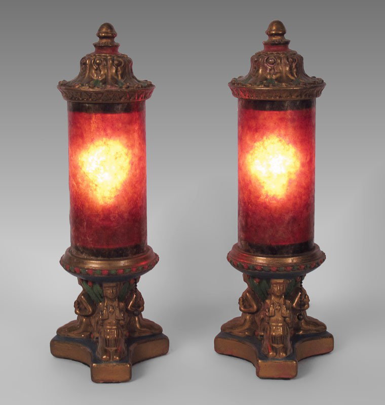 PAIR OF ART DECO MICA SHADE LAMPS: PAIR OF ART DECO MICA SHADE LAMPS: Terra cotta polychrome base and lids with base featuring semi nude seated women. Fitted mica shades. 18 1/4" h. x 7" base dia.