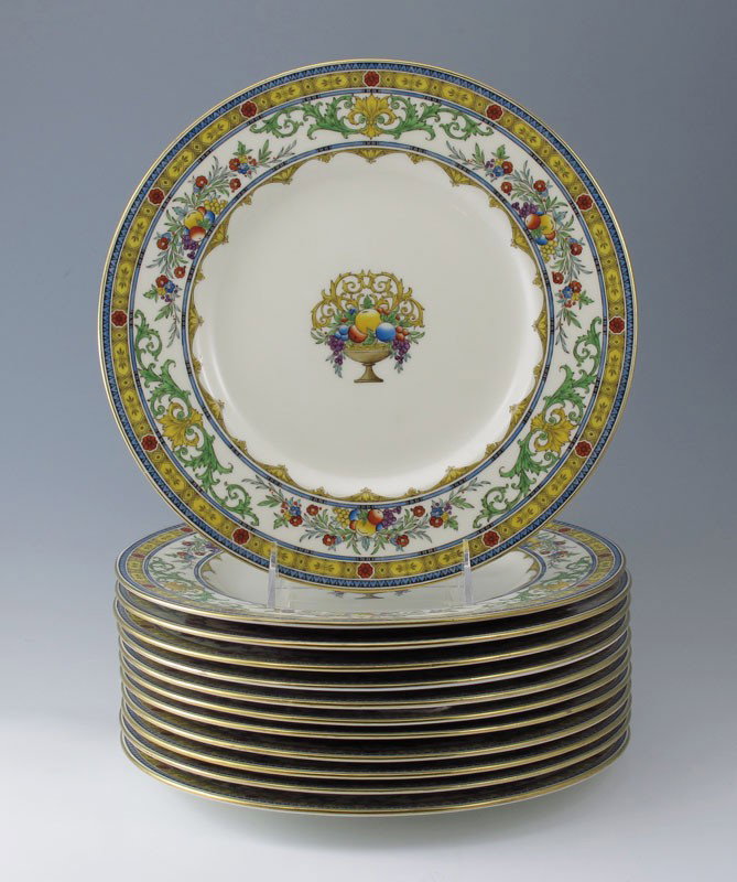 12 MINTON SERVICE PLATES H3959: SET OF 12 MINTON SERVICE PLATES: Ca. 1920's. Heavy enamel decoration centering fruit filled bowl. Pattern H3959 with color variation. 10 1/2'' dia.