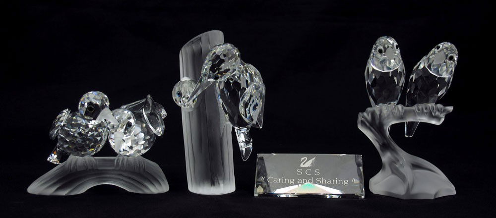 SWAROVSKI CRYSTAL CARING & SHARING SERIES FIGURES: SWAROVSKI CRYSTAL FIGURINES: CARING & SHARING SERIES to include, 1987 LOVEBIRDS "Togetherness" D01X861, Adi Stocker / Max Schreck designer, bad box & foam; 1988 WOODPECKERS "Sharing" D01X881, Adi Stoc
